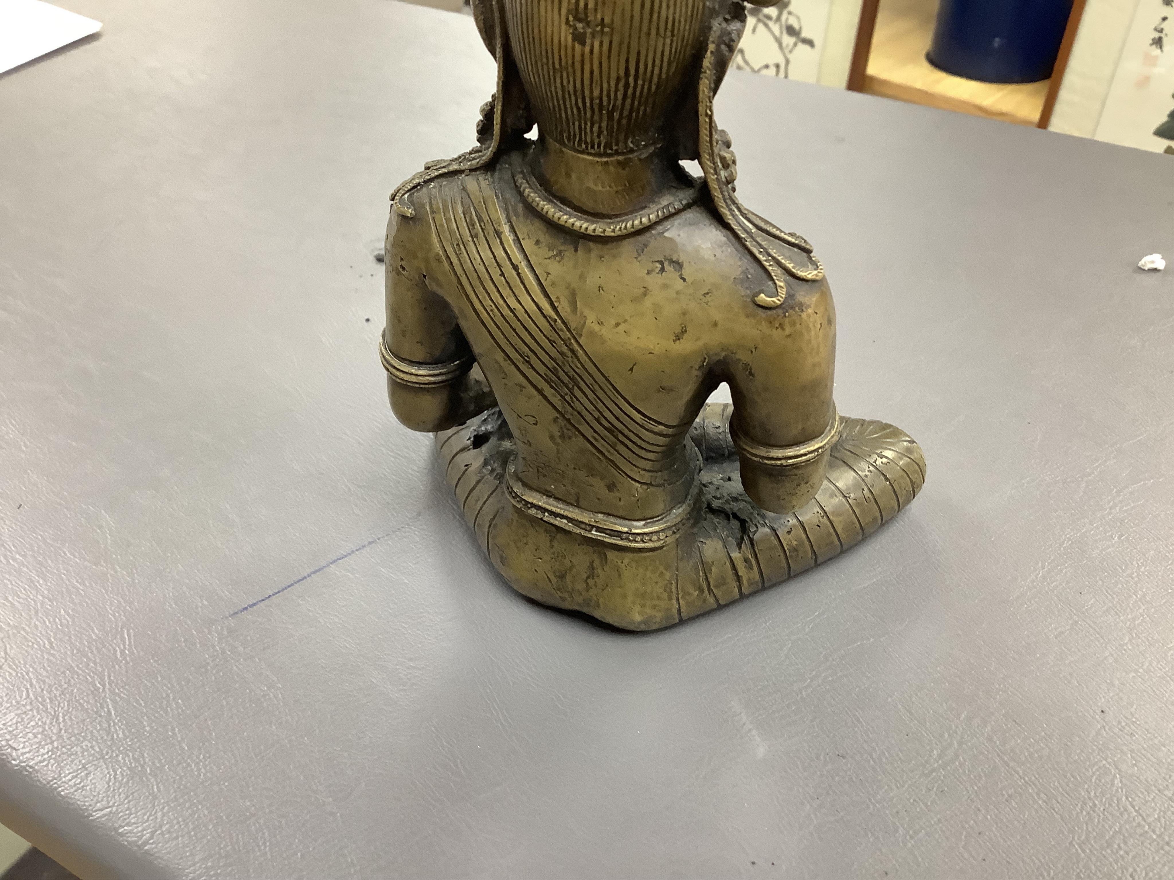 A Nepalese bronze seated figure of Avalokiteshvara, 19th century, 18cm high
